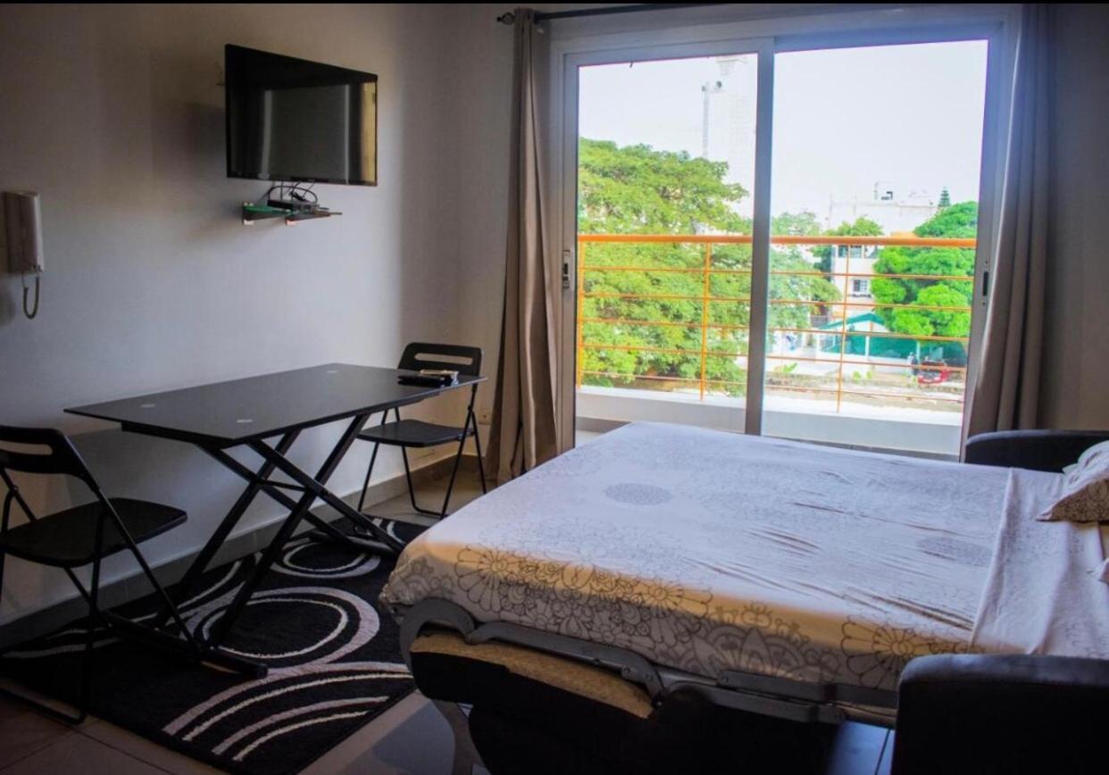 Le First Concept Apartment Dakar Exterior foto