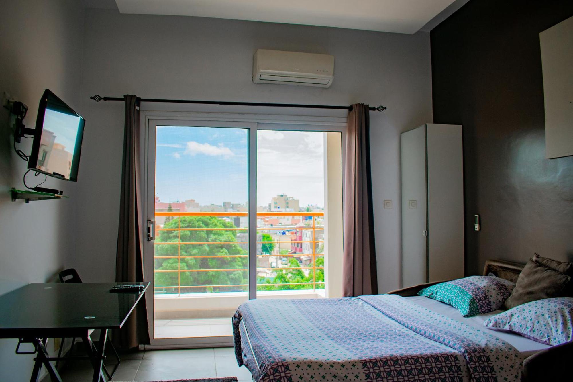 Le First Concept Apartment Dakar Exterior foto